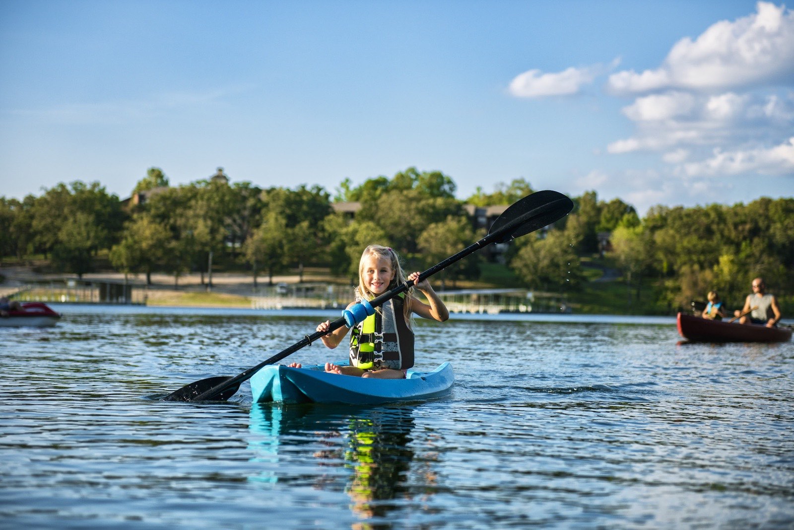 A child kayaking from WaterMill Cove on Table Rock Lake