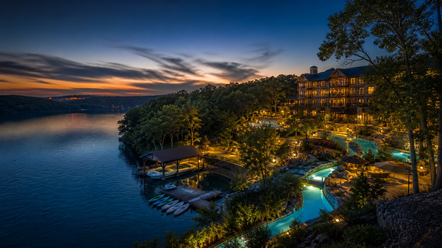 An illustrative twilight lake-resort concept created for the WaterMill Cove guest companion